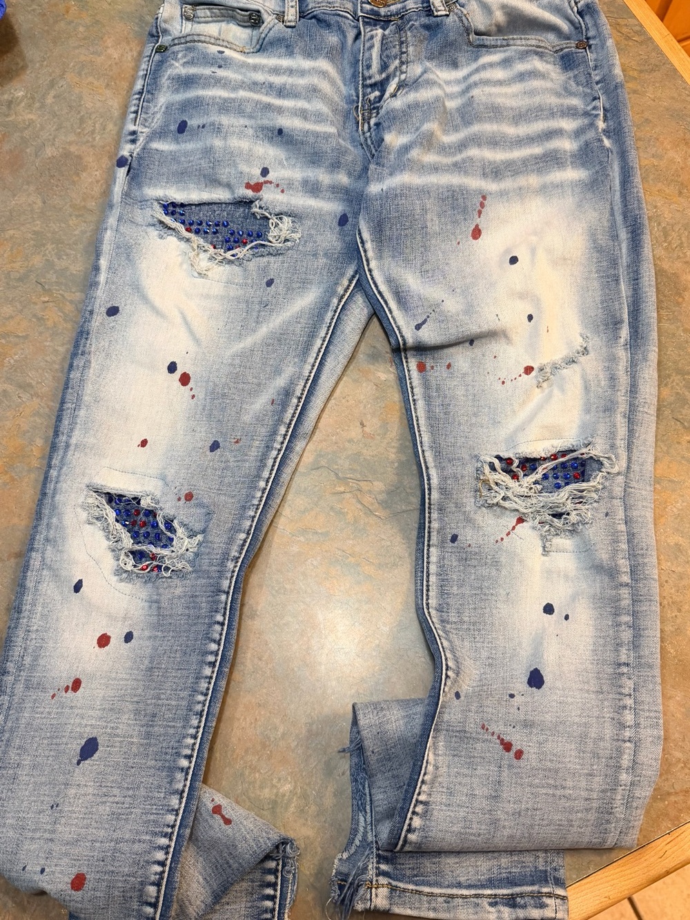 Light Blue Distressed Skinny Jeans with Paint-Splatter Detail